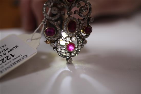 An attractive early 20th century gold and platinum, ruby and diamond pendant brooch, overall 2.5in.